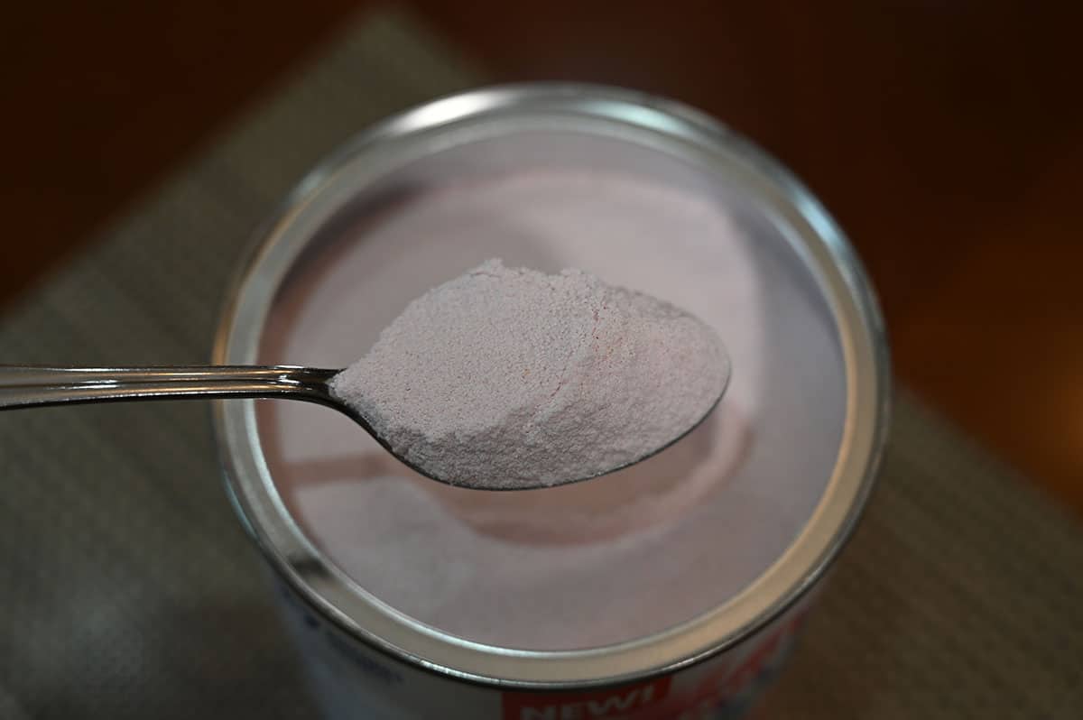 Costco Good Host Raspberry Lemonade with lid off so you can see the top of the container and what the powder looks like. 