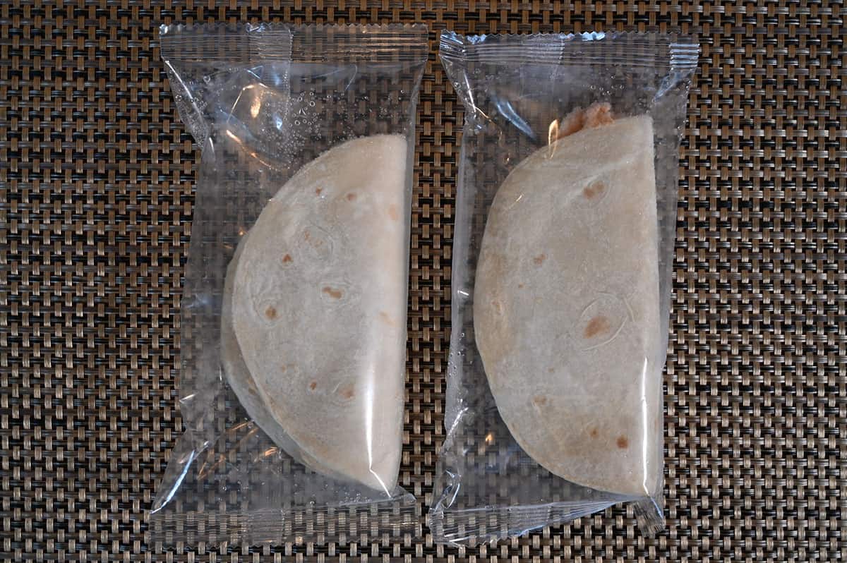 Image showing two Costco Catarina Chicken Quesadillas in plastic packaging, before cooking.