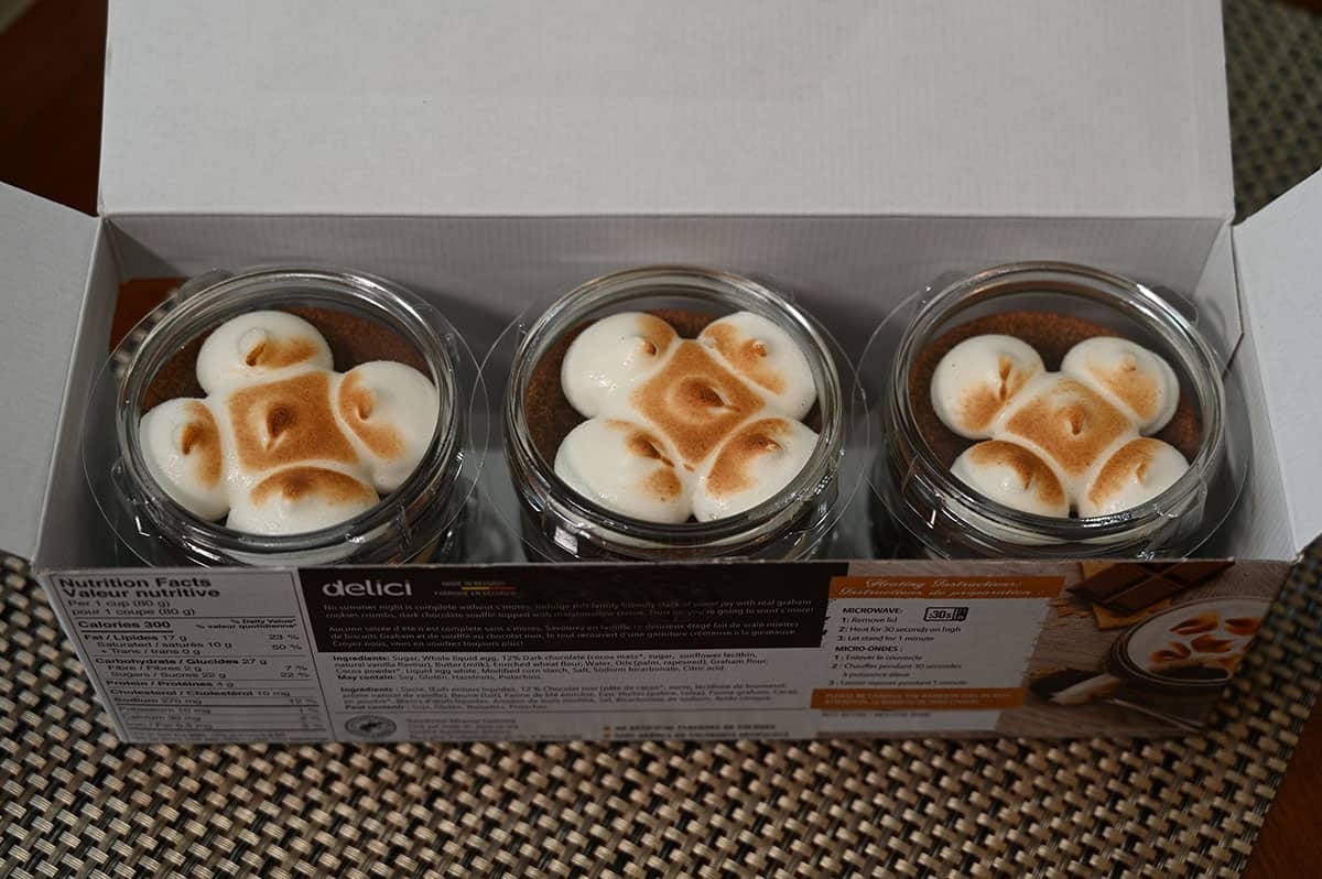 Image of the Costco delici Chocolate S'mores Soufflés packaging showing that there are six jars in the box. 