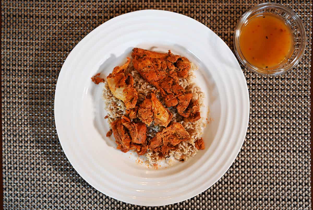 Costco Spice Mantra Tandoori Chicken  cooked and served on a white plate, top down image.