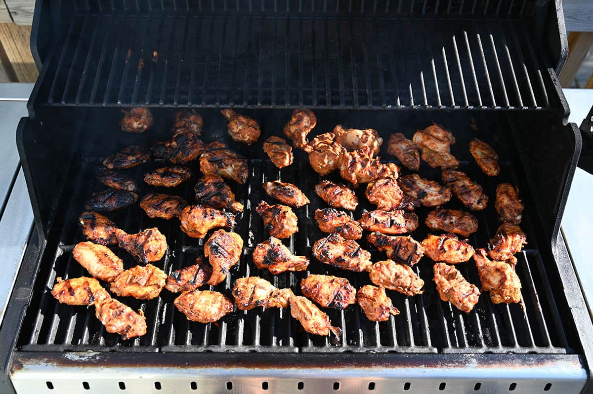 Image of the Costco seasoned chicken wings on the barbecue after being cooked.