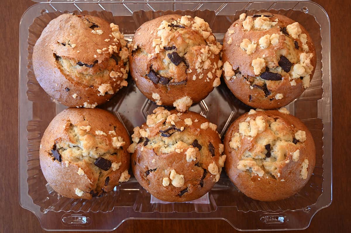 Image of the six pack of chocolate banana muffins in the container with the lid off.