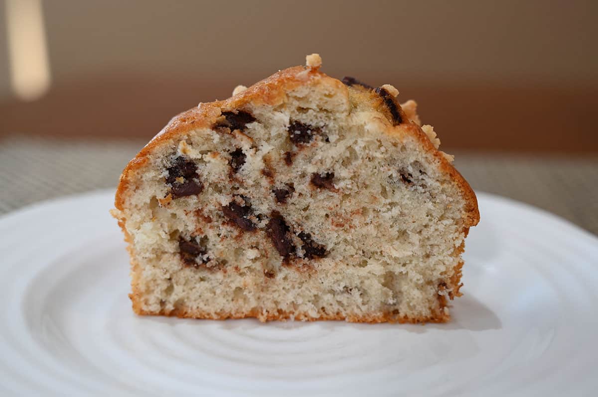 Image of a banana chocolate muffin cut in half so you can see the middle.