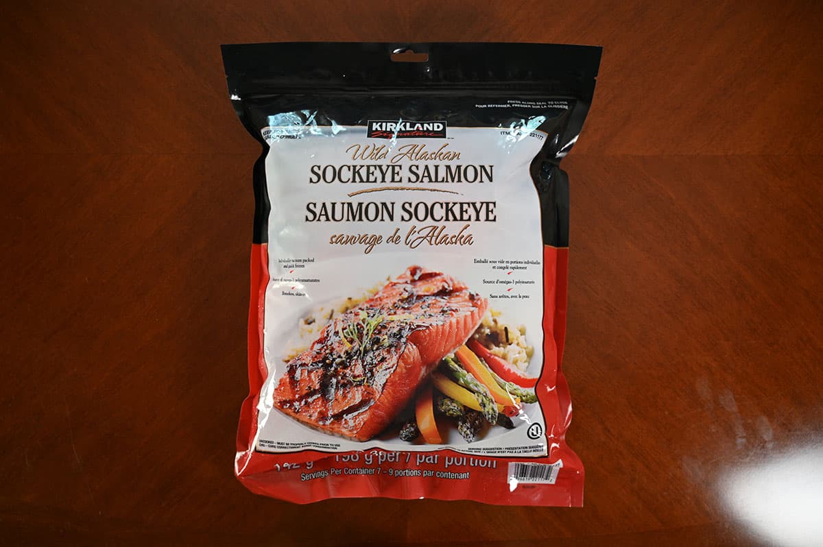Costco Kirkland Signature Wild Alaskan Sockeye Salmon bag on a table. Top down image.