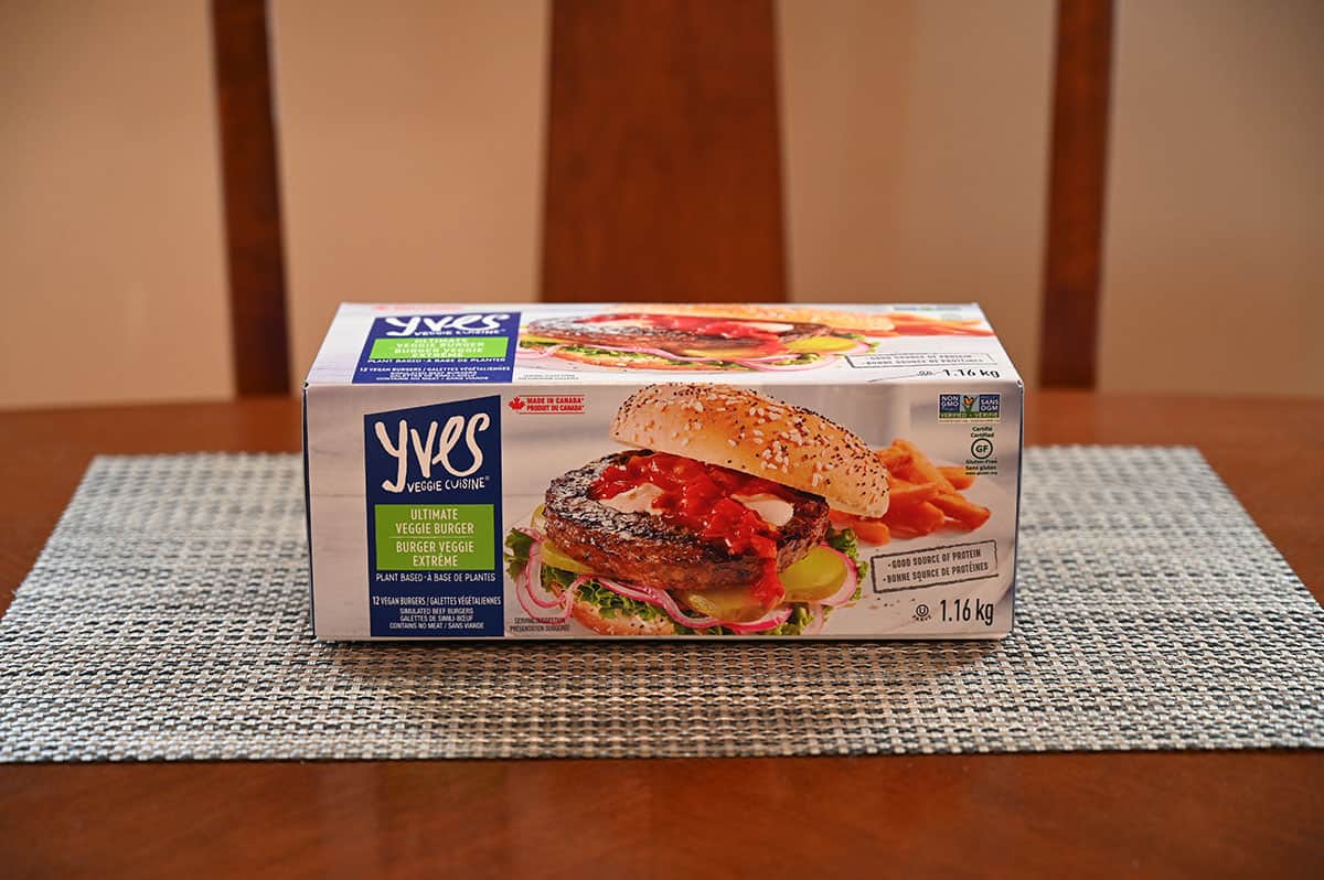 Box of veggie burgers sitting on a table side view image.