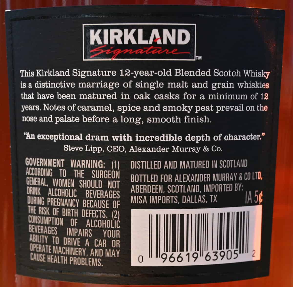 Costco 12 Years Old Blended Scotch Whisky product description on the label on the bottle.