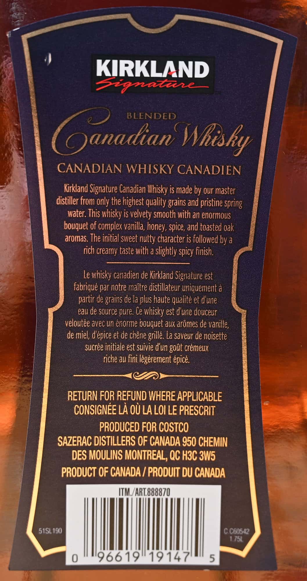 Image of the back label on the Costco Canadian Whisky showing the product description.