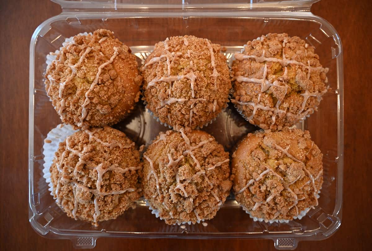 Top down image of the Costco apple crumb muffins with the lid off.