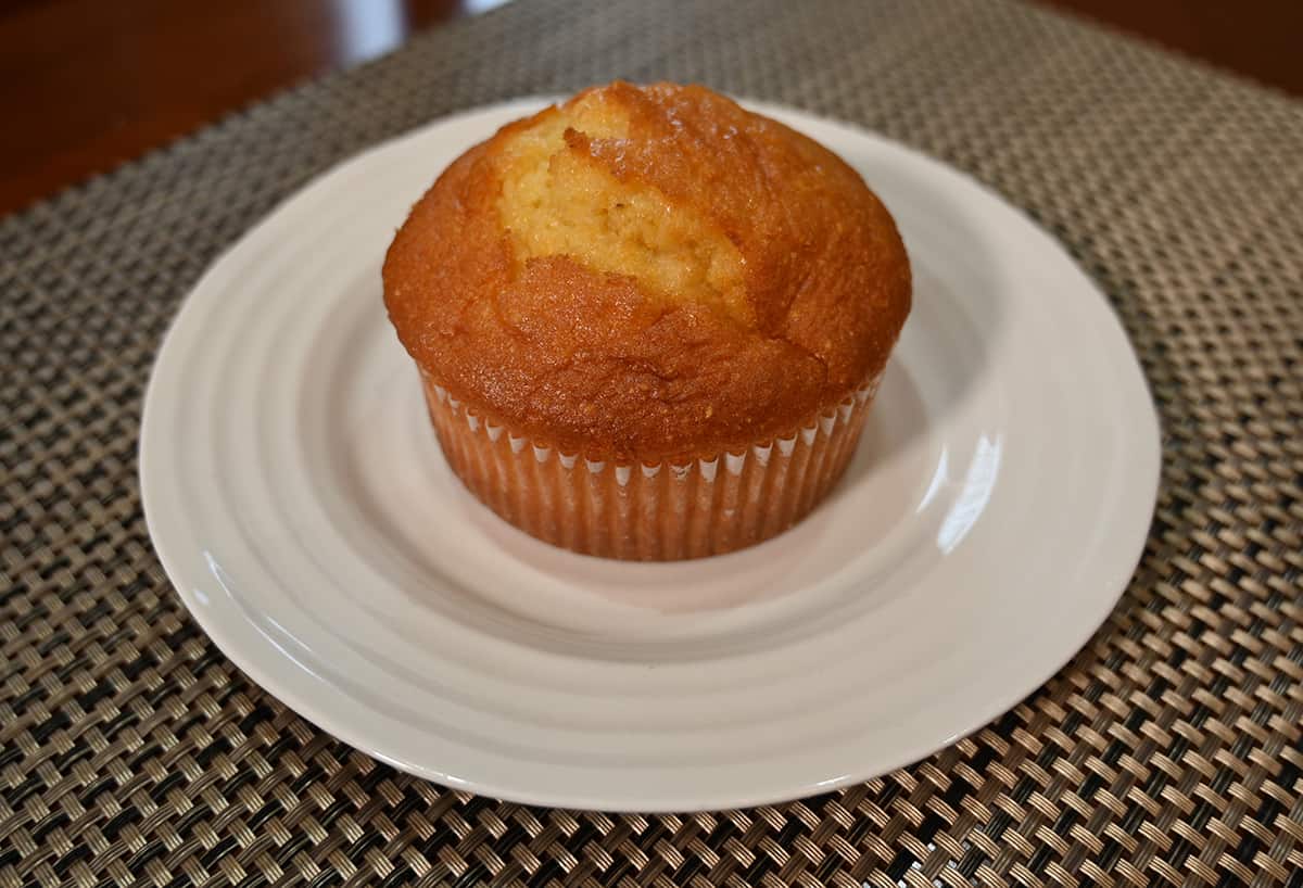 Image of one corn muffin on a plate.