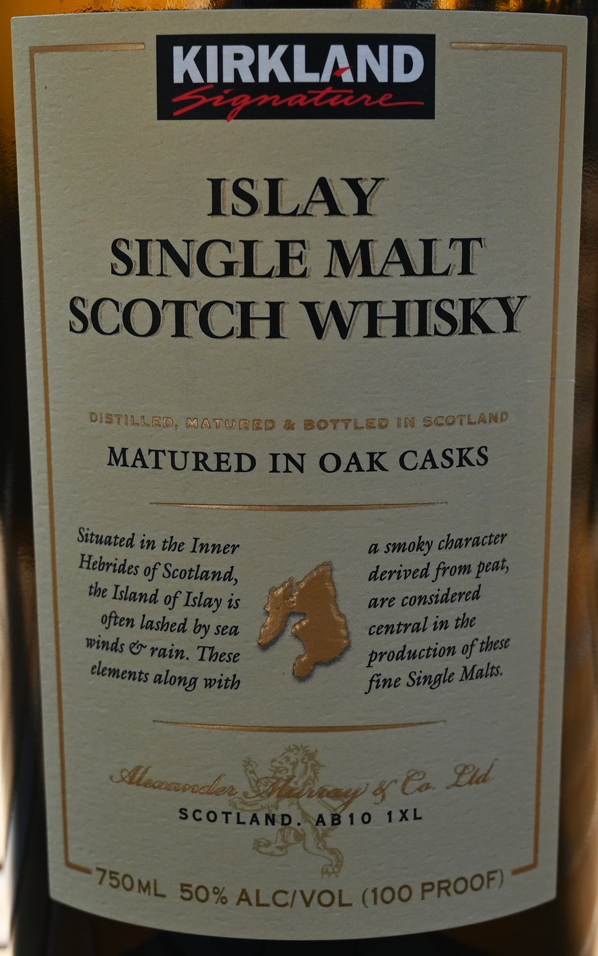 Closeup image of the front label on the Islay Scotch Whisky from Costco showing where it's made and that it is matured in oak casks.