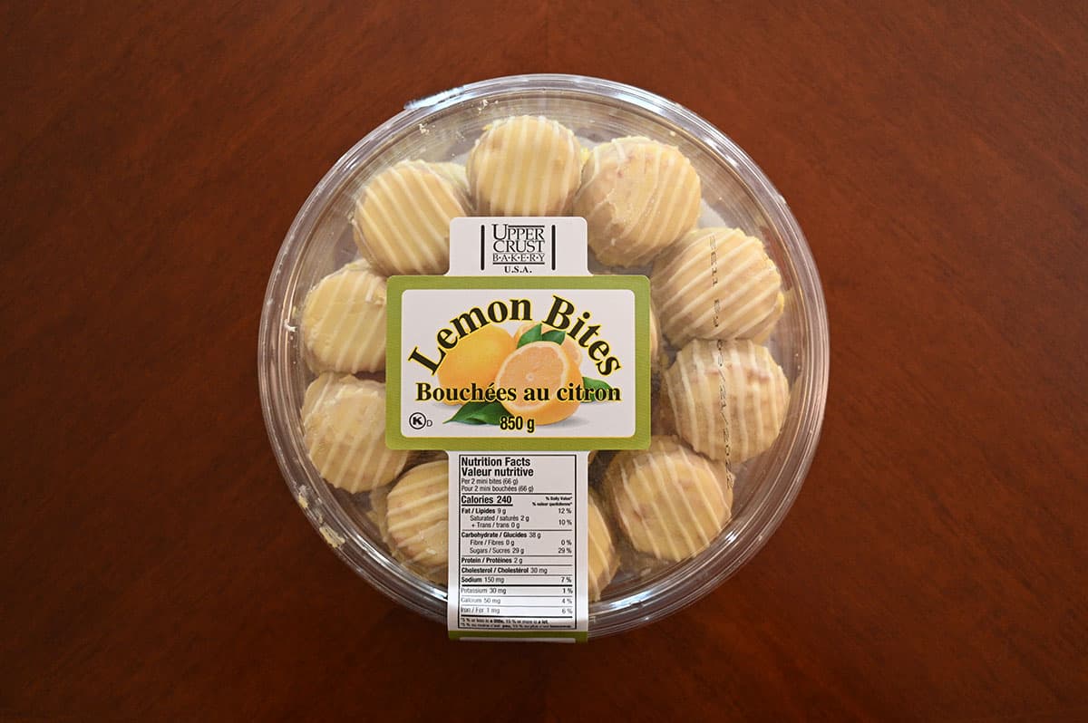 Costco Upper Crust Bakery Lemon Bites container sitting on a table.