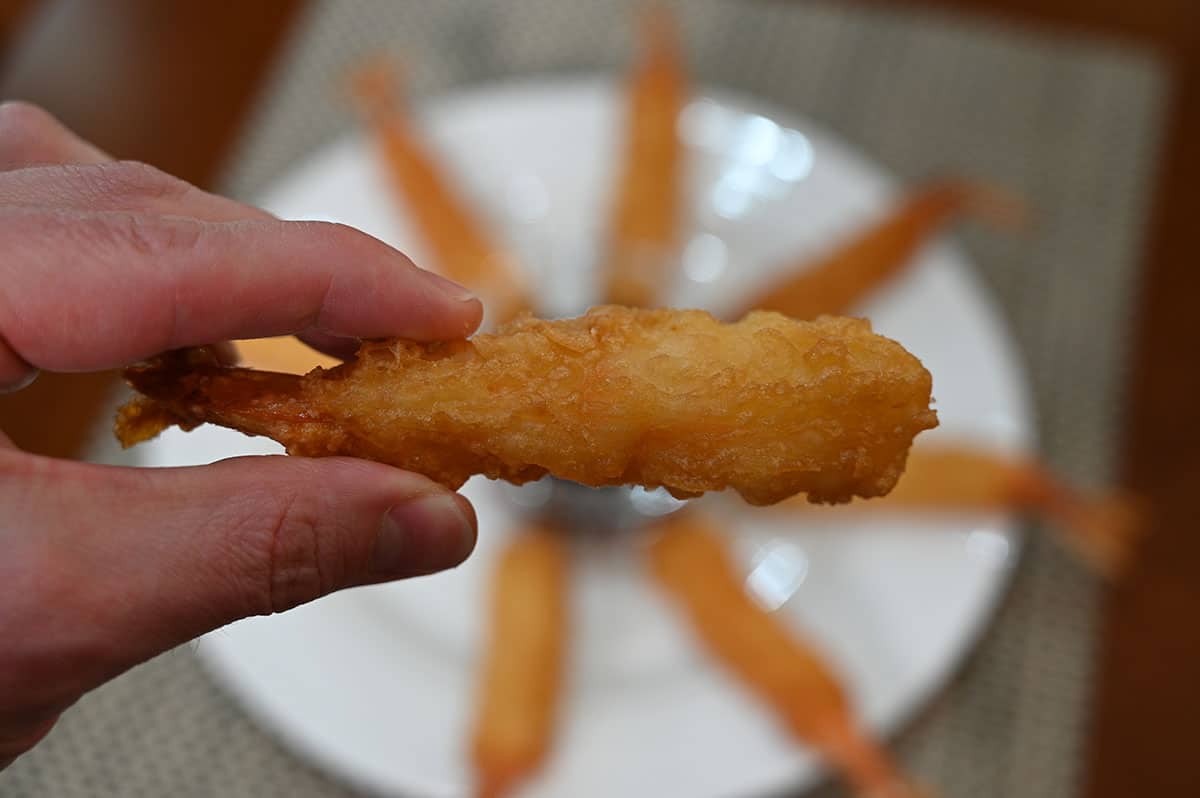 Closeup image of one cooked tempura shrimp.