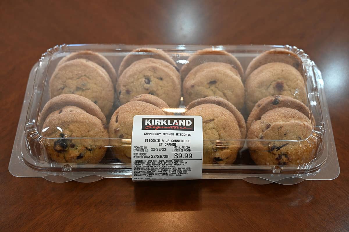 Image of the Costco Kirkland Signature Cranberry Orange Bisconie package on a table. Top down image.