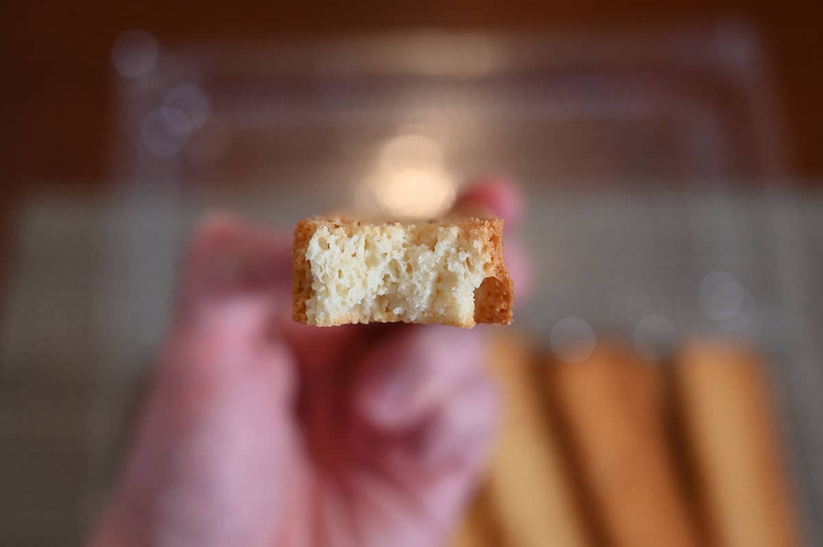 Closeup image of one rusk with a bite taken out.