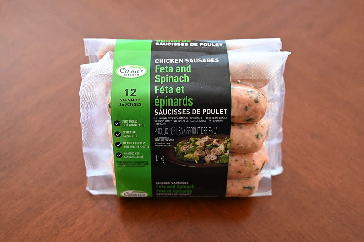 Image of the pack of Costco Connie's Kitchen Feta and Spinach Chicken Sausages on a table.