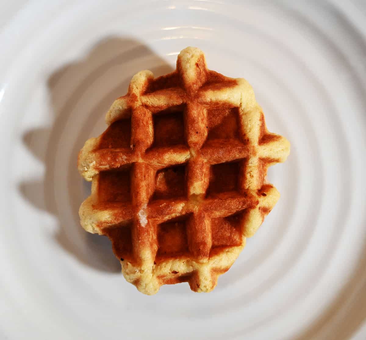 Image of one waffle unpackaged and on a plate.