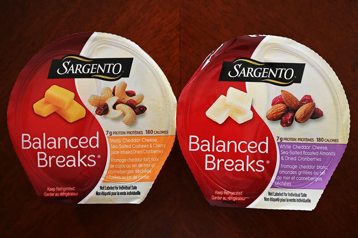 Top down image of the sharp cheddar Balanced Break pack beside the White Cheddar balanced break pack.