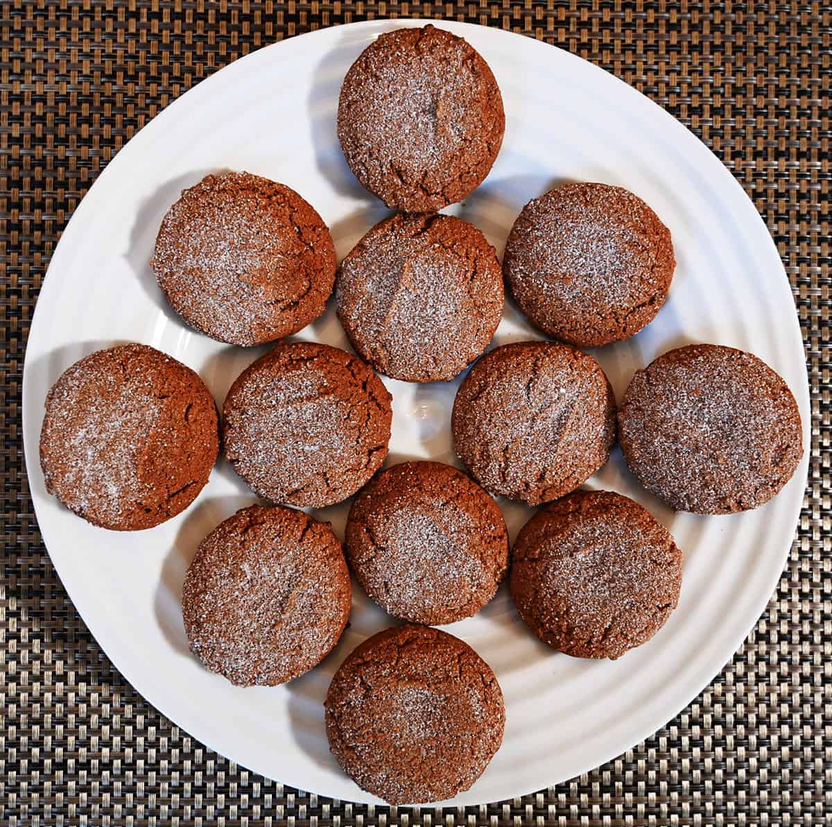 Ginger cookies served on a white plate, top down image.