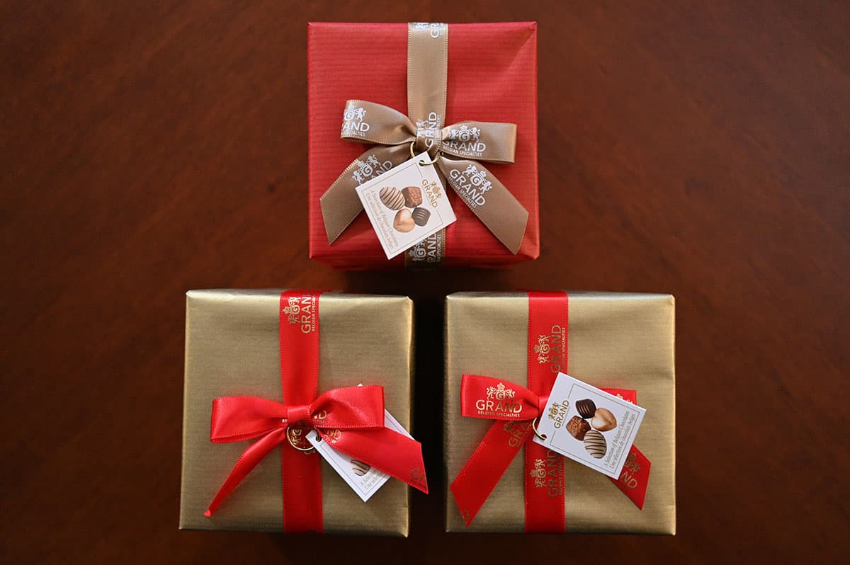 Image showing the three small boxes of chocolates that come gift wrapped with a bow.