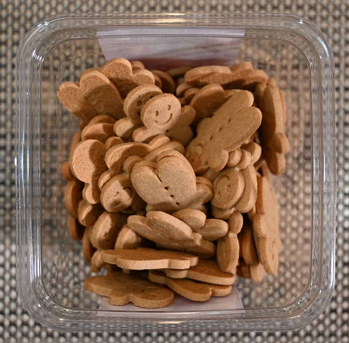 Top down image of the open container of gingerbread cookies.