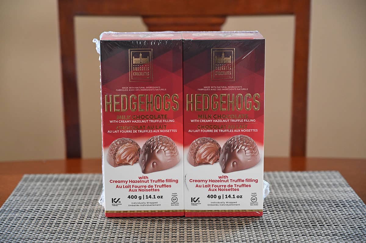 Image showing the Costco House of Brussels Chocolates Hedgehogs package of two boxes of chocolate sitting on a table.