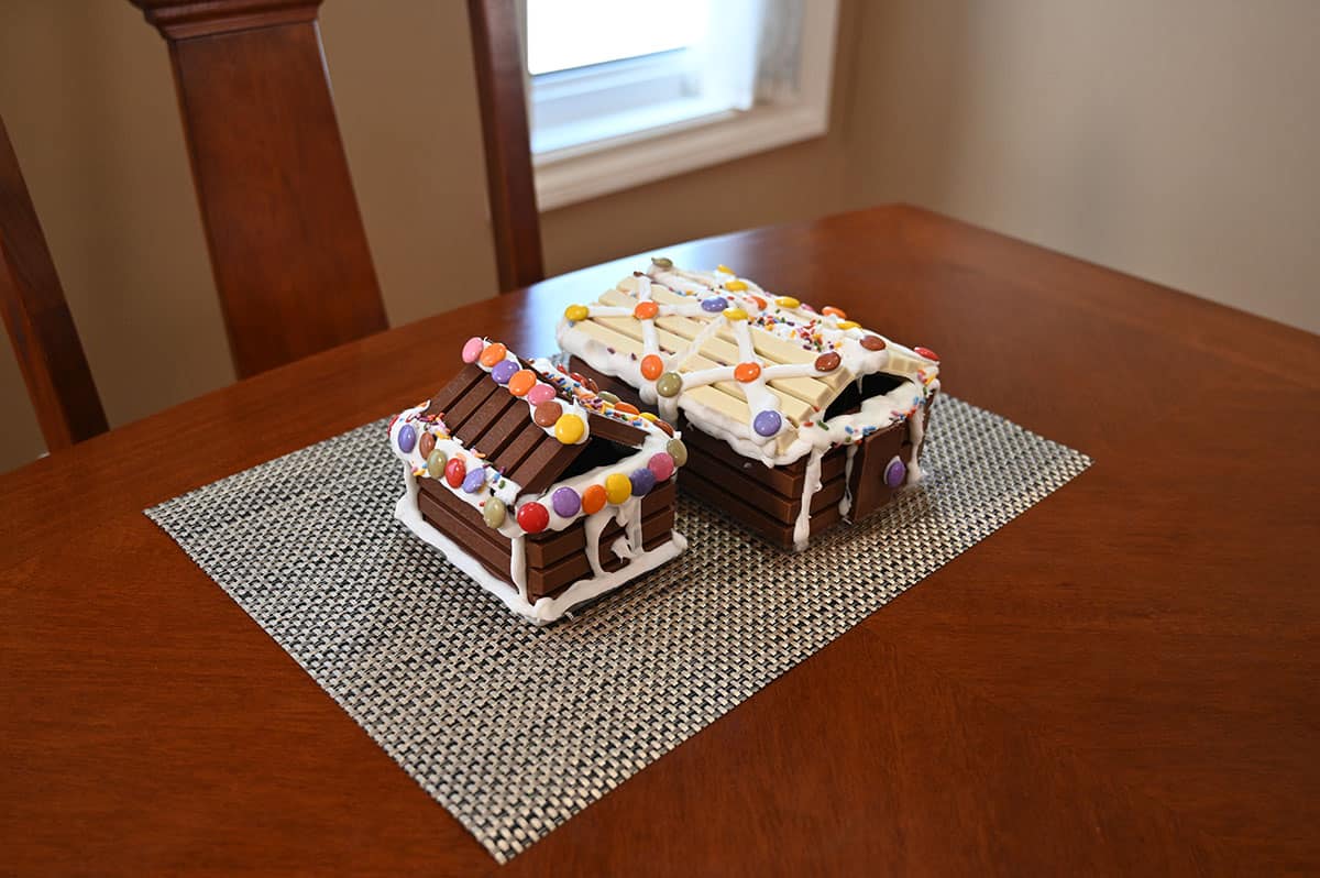 Image of a built Kit Kat cabin and a hut sitting on a table.