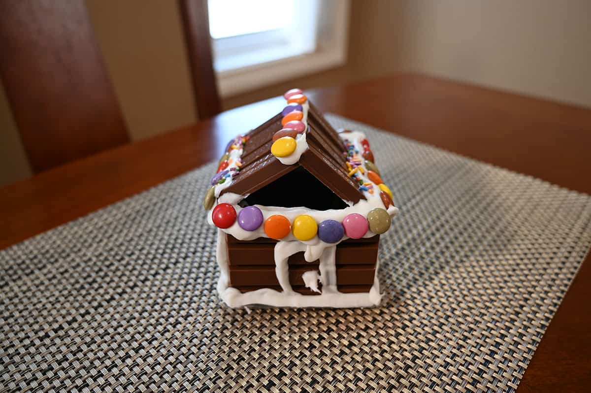 Closeup image of a built Kit Kat hut sitting on a table.