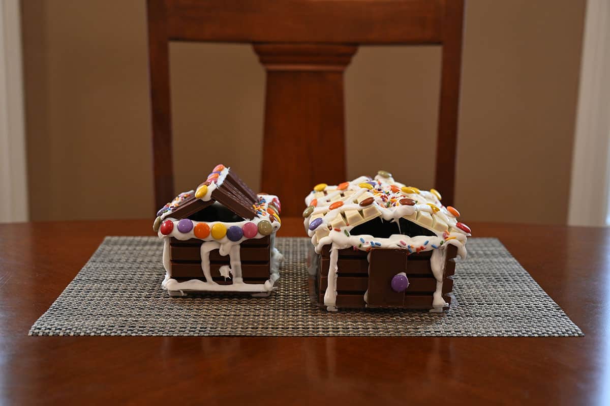 Image of a built Kit Kat cabin and a hut sitting on a table.