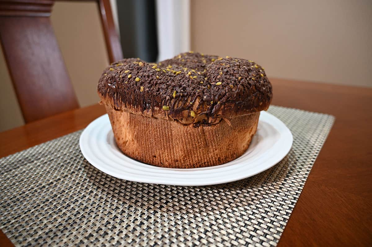 Image of the Costco de Milan Panettone unwrapped and the whole panettone is served on a white plate.