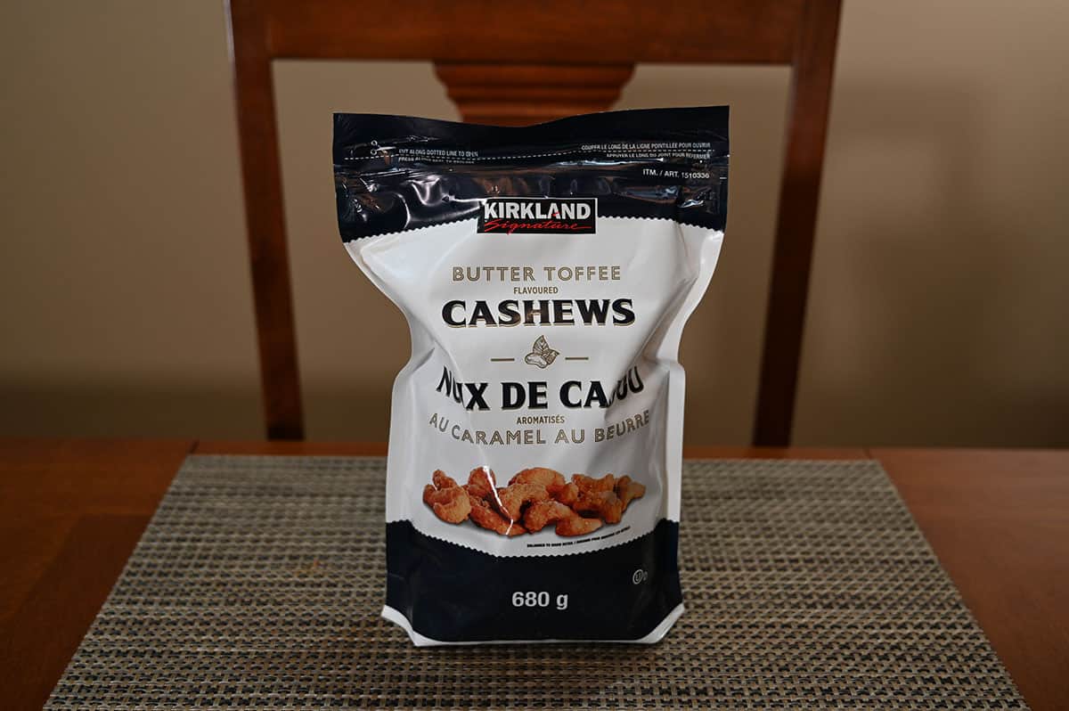 Image of the Costco Kirkland Signature Butter Toffee Cashews bag sitting on a table.