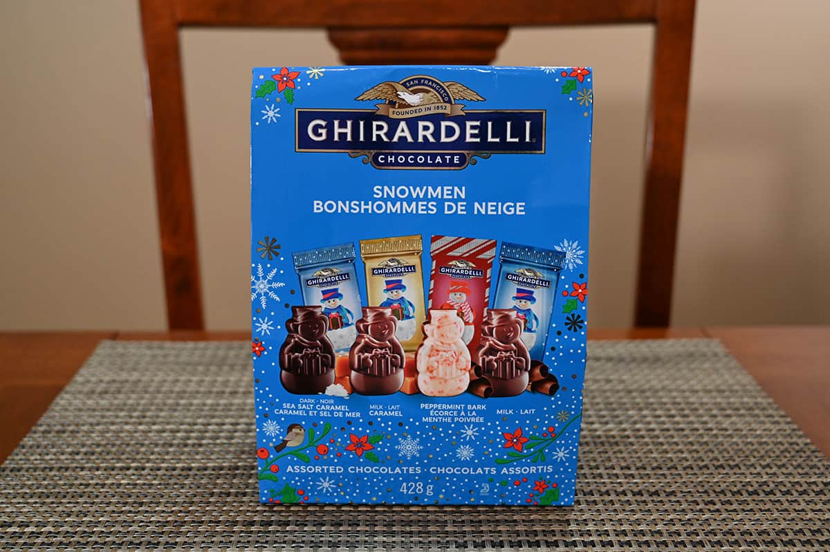 Image of the bag of Costco Ghirardelli Chocolate Snowmen sitting on a table.