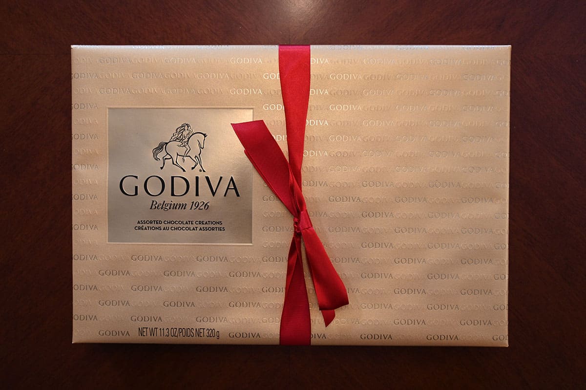 Costco Godiva Assorted Chocolate Creations box sitting on a table, top down image.