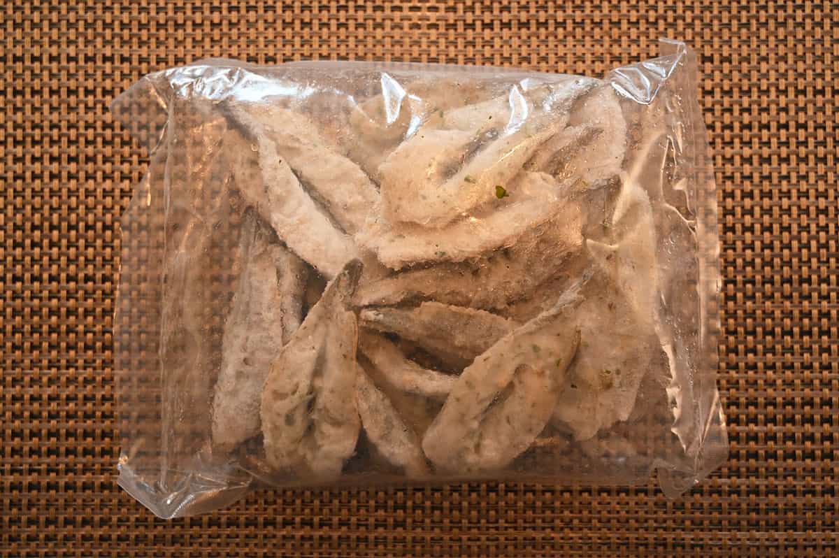 Image of a plastic bag with the raw shrimp. Showing how the shrimp comes packaged.