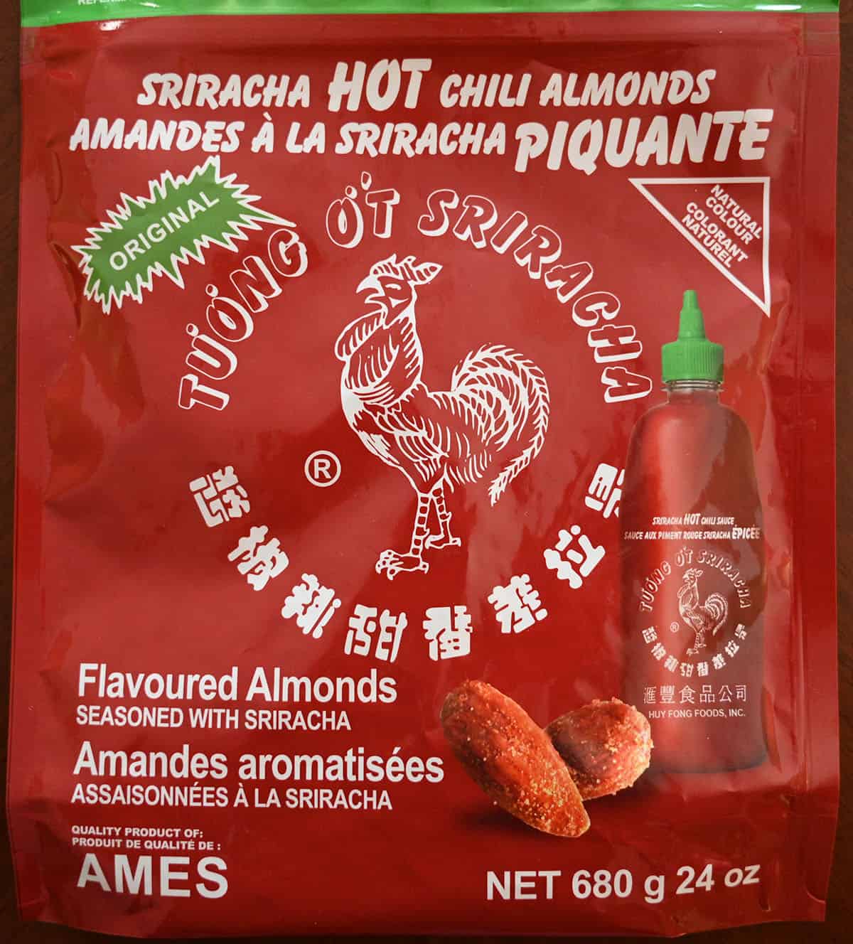 Closeup image of theg front of the sriracha almonds bag. 