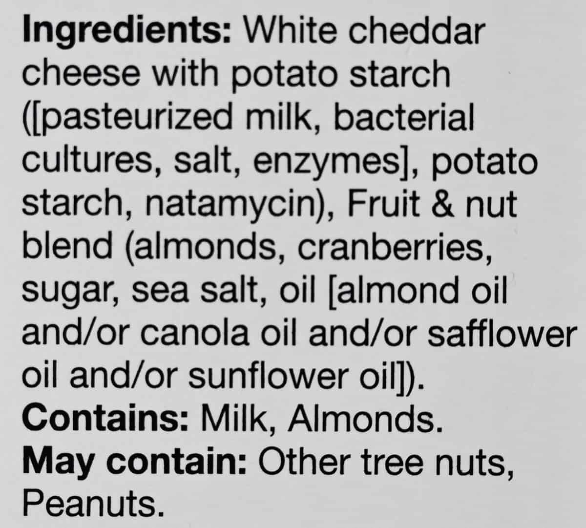 Image of the ingredients label for the white cheddar pack from the back of the box.