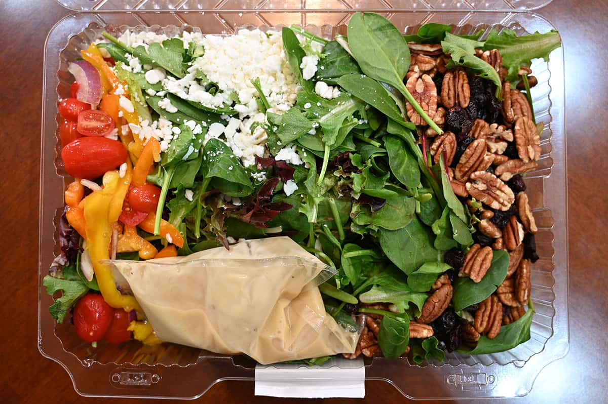 Top down image of the salad in the container with the lid off showing what the ingredients.