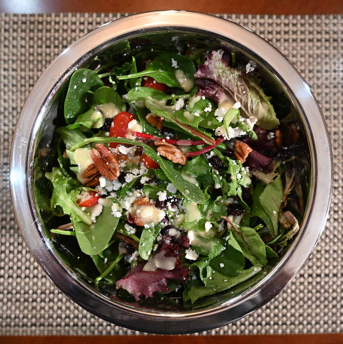 Top down image of the salad prepared in a metal bowl.