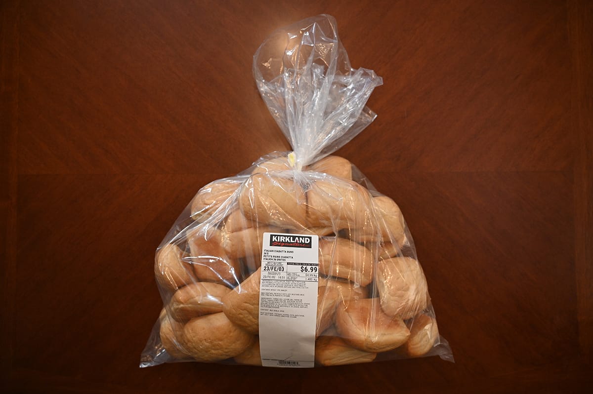 Image of a bag of the Costco Italian Ciabatta Buns sitting on a table.