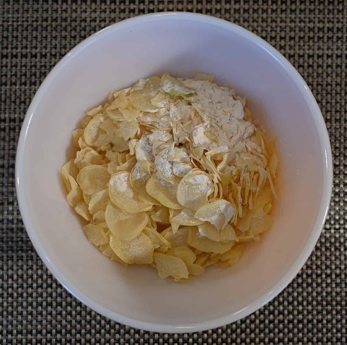Top down image of a bowl containing the dehydrated potatoes from the Johnny's potatoes au gratin.