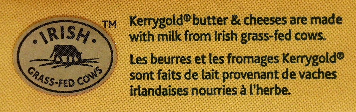 Image of the product description from the back of the cheese stating it's made with milk from Irish grass-fed cows.