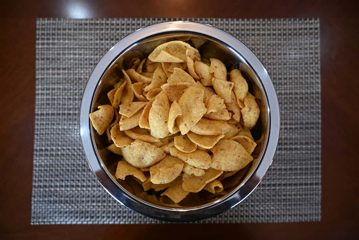 Top down image of the Kirkland Signature Corn Chip Dippers poured into a metal bowl.