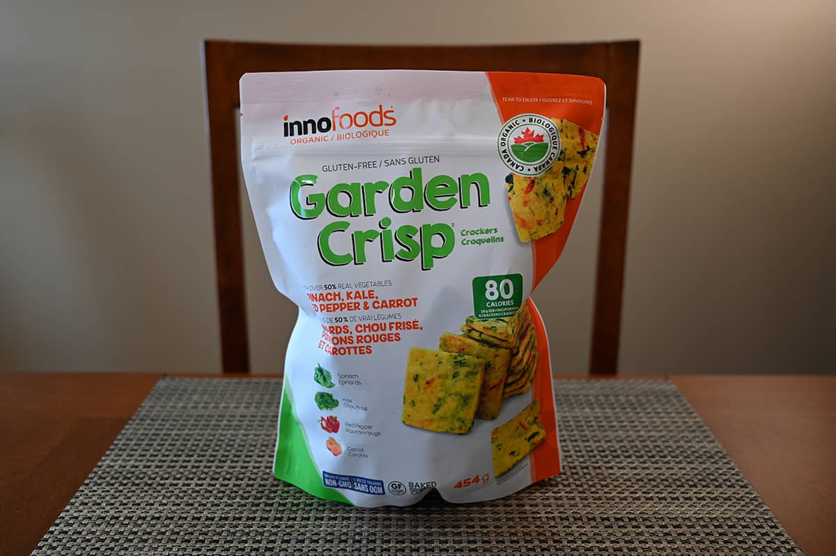 Image of the Costco Innofoods Garden Crisp Crackers bag sitting on a table.