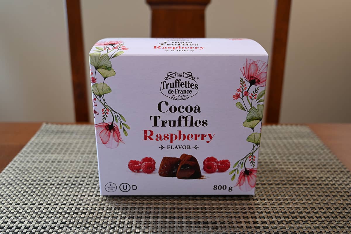 Image of the Costco Truffettes De France Cocoa Raspberry Truffles box sitting on a table.