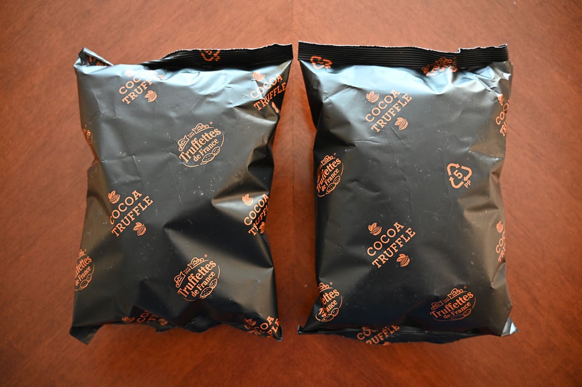 Image of the two bags of truffles that come in the box sitting on a table.