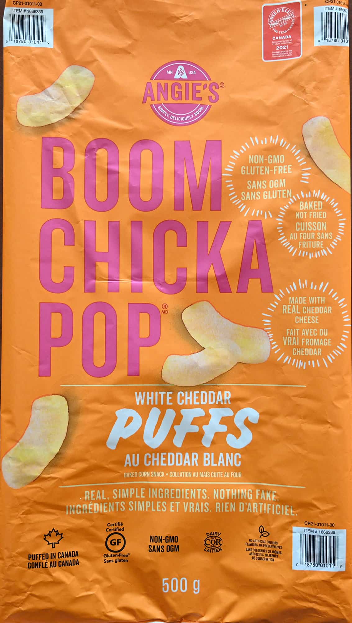 Closeup image of the front of the Costco Angie's Boom Chicka Pop White Cheddar Puffs bag showing the weight.