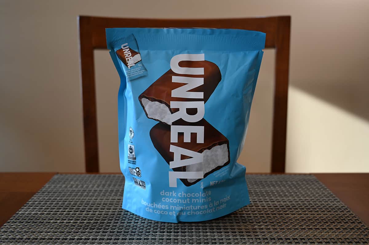 Image of the Costco Unreal Dark Chocolate Coconut Mini Bars bag sitting on a table.