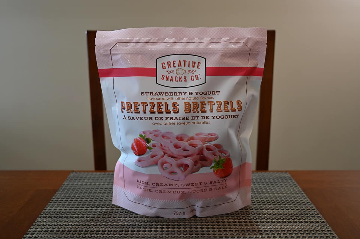 Image of the Costco Creative Snacks Strawberry & Yogurt Pretzels bag sitting on a table.