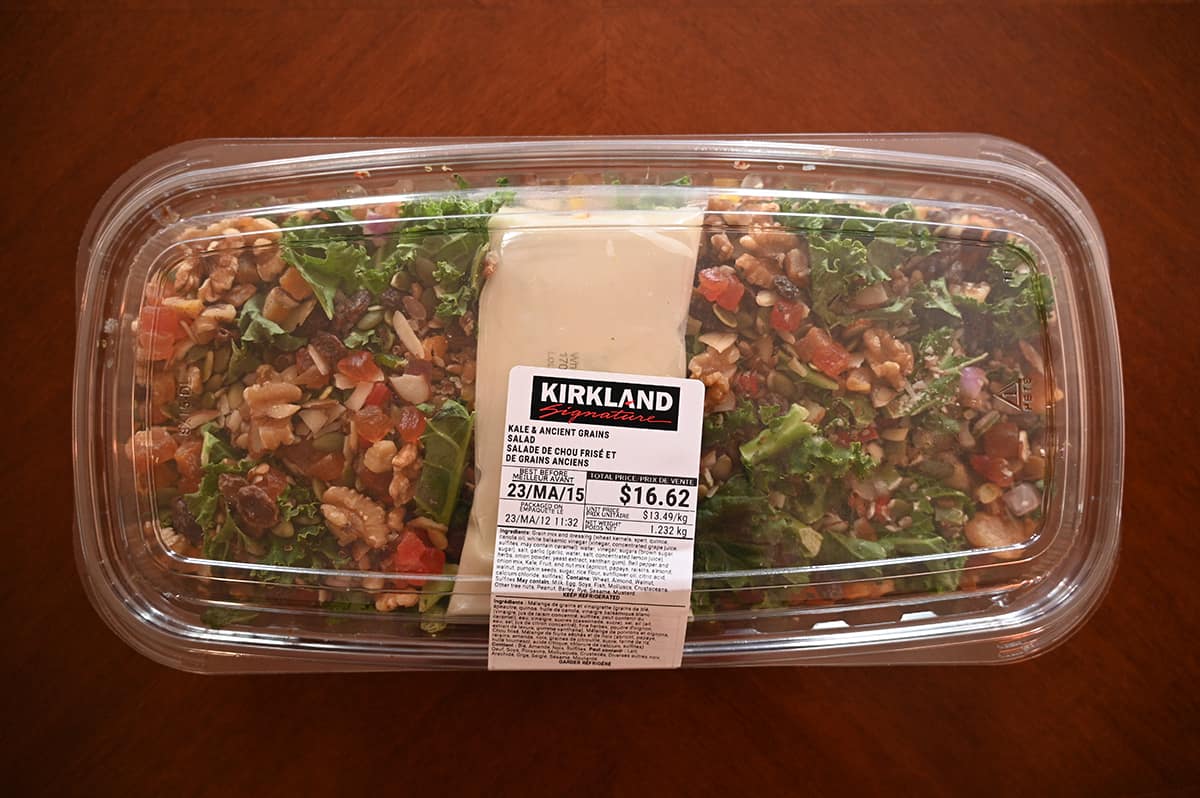 Top down image of the Costco Ancient Grains Salad sitting on a table unopened.