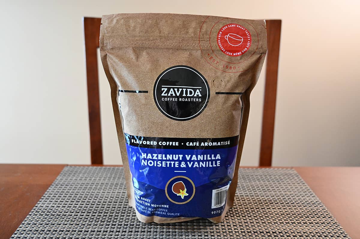 Image of the Costco Zavida Hazelnut Vanilla Flavored Coffee bag of beans sitting on a table.