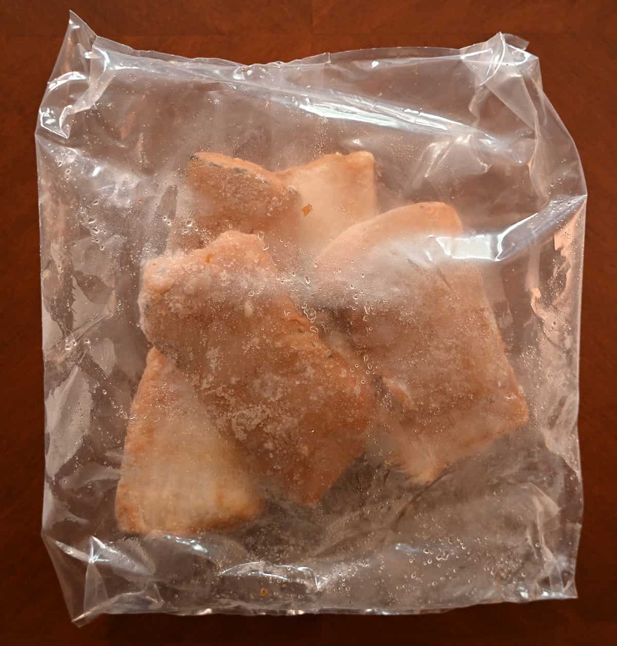 Image showing the bag of cod that comes in the box, in the bag there are four pieces of cod.